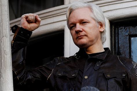 when was julian assange charged